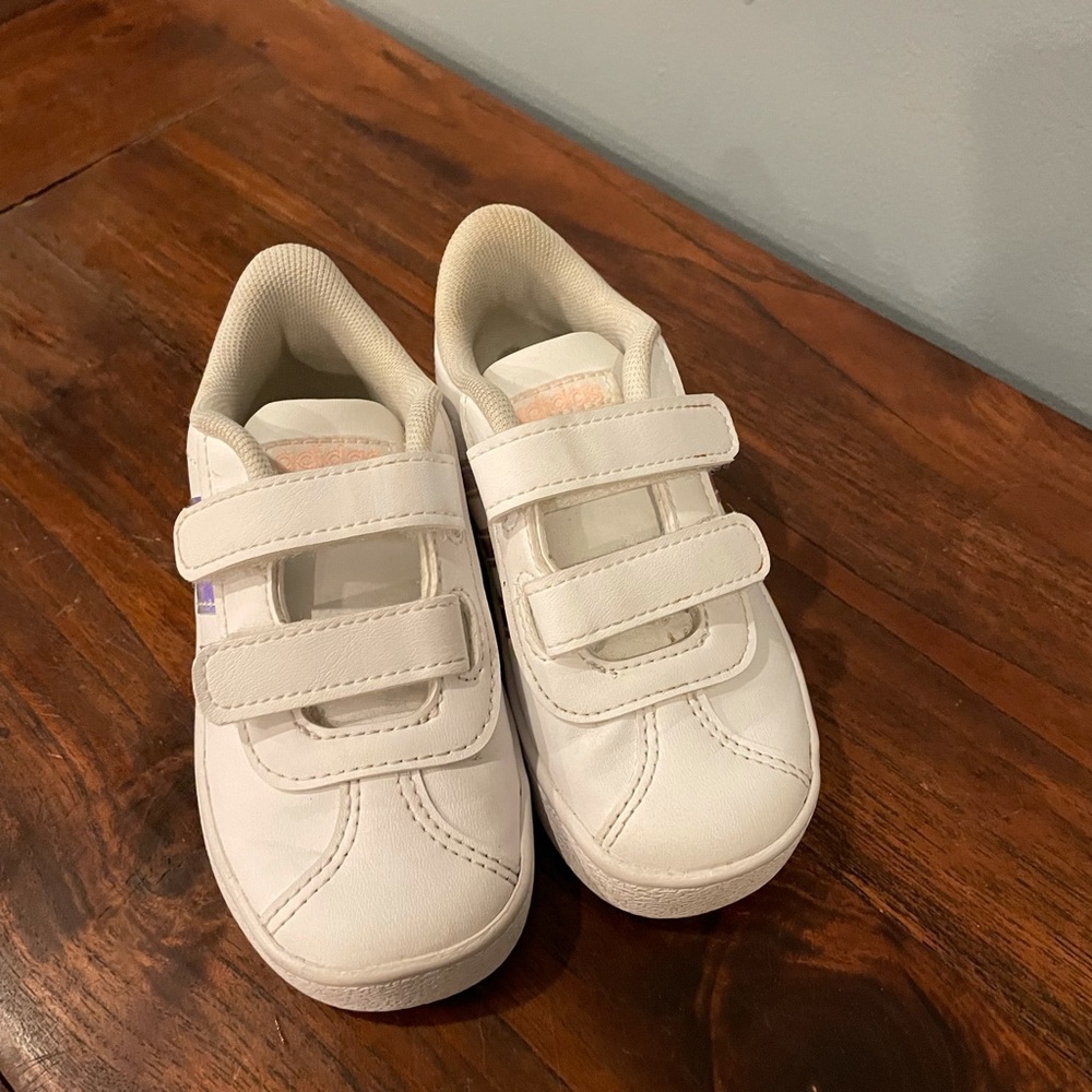 Cute girl sneakers, only worn a couple of times. White with neon stripes.
